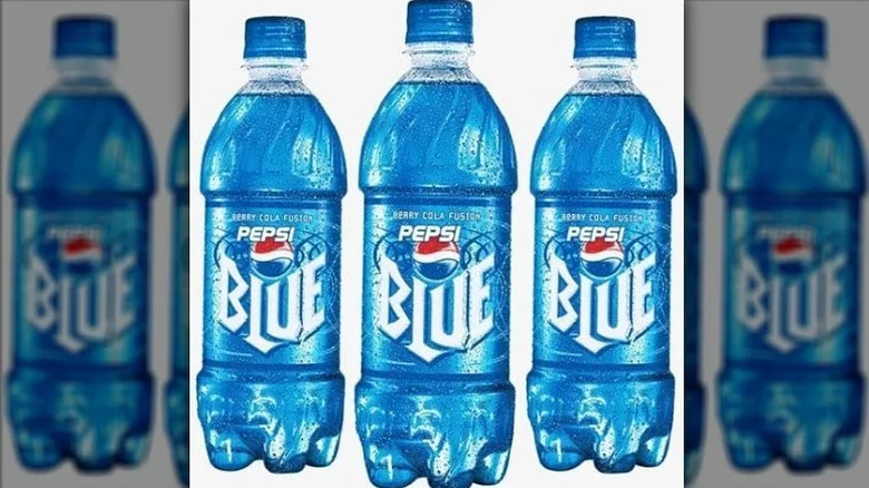 three bottles of Pepsi blue on a white background