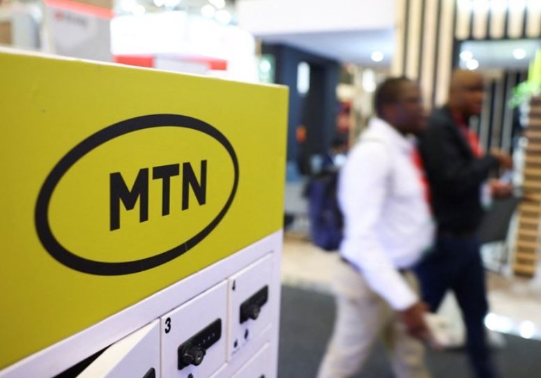 File photo: Delegates walk past the MTN logo at the Investing in African Mining Indaba 2024 conference in Cape Town, South Africa, 7 February 2024. Reuters/Esa Alexander/File Photo