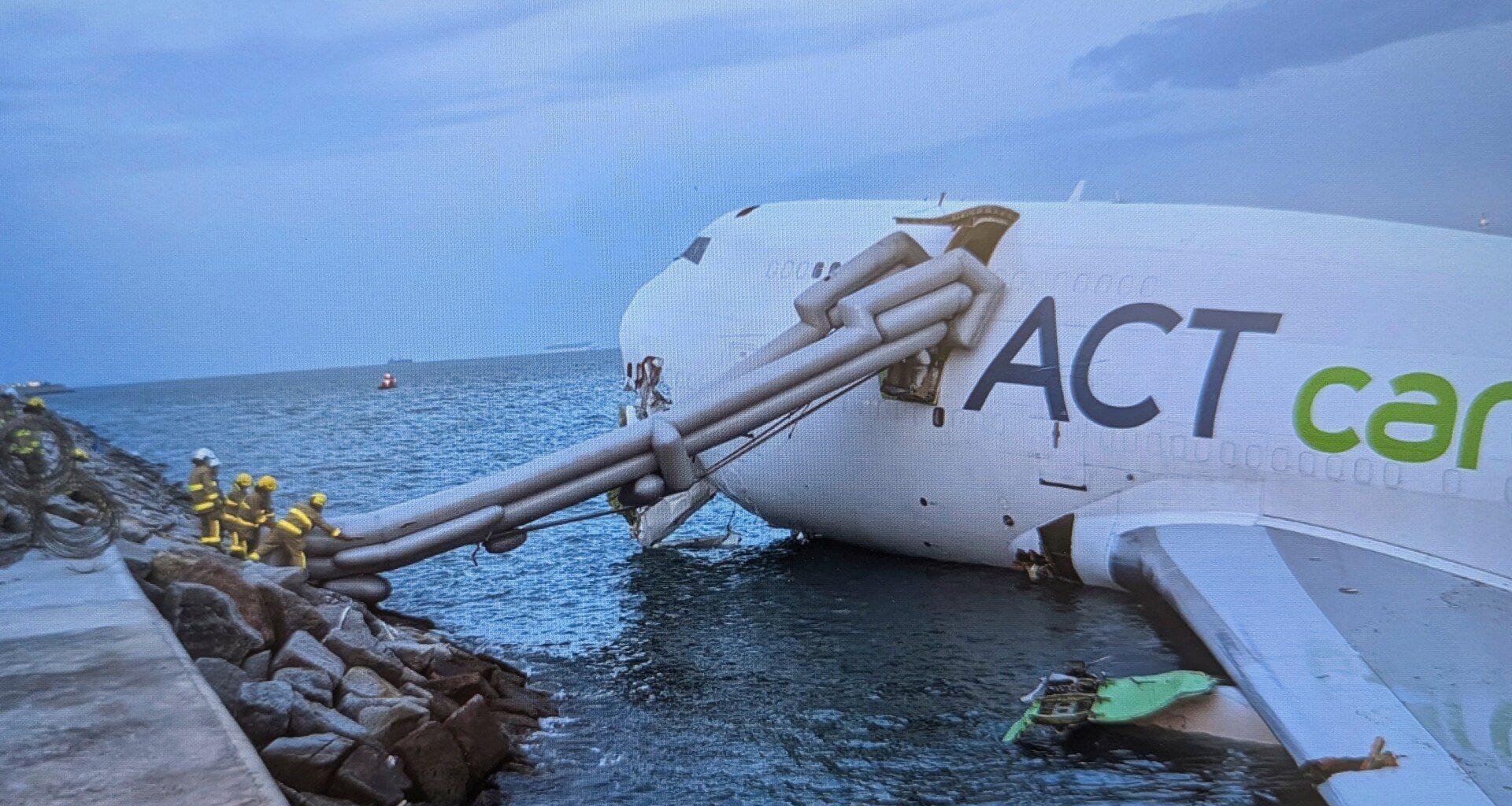 Two killed as cargo plane skids off Hong Kong runway | Aviation News