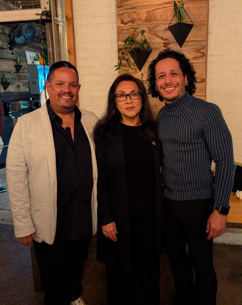ALMA Board Chair Julio Rodriguez, ALMA del L¡der Award recipient Alma Izquierdo and ALMA Executive Director Manuel Hern ndez-Nu¤ez. Photo by Carrie Maxwell