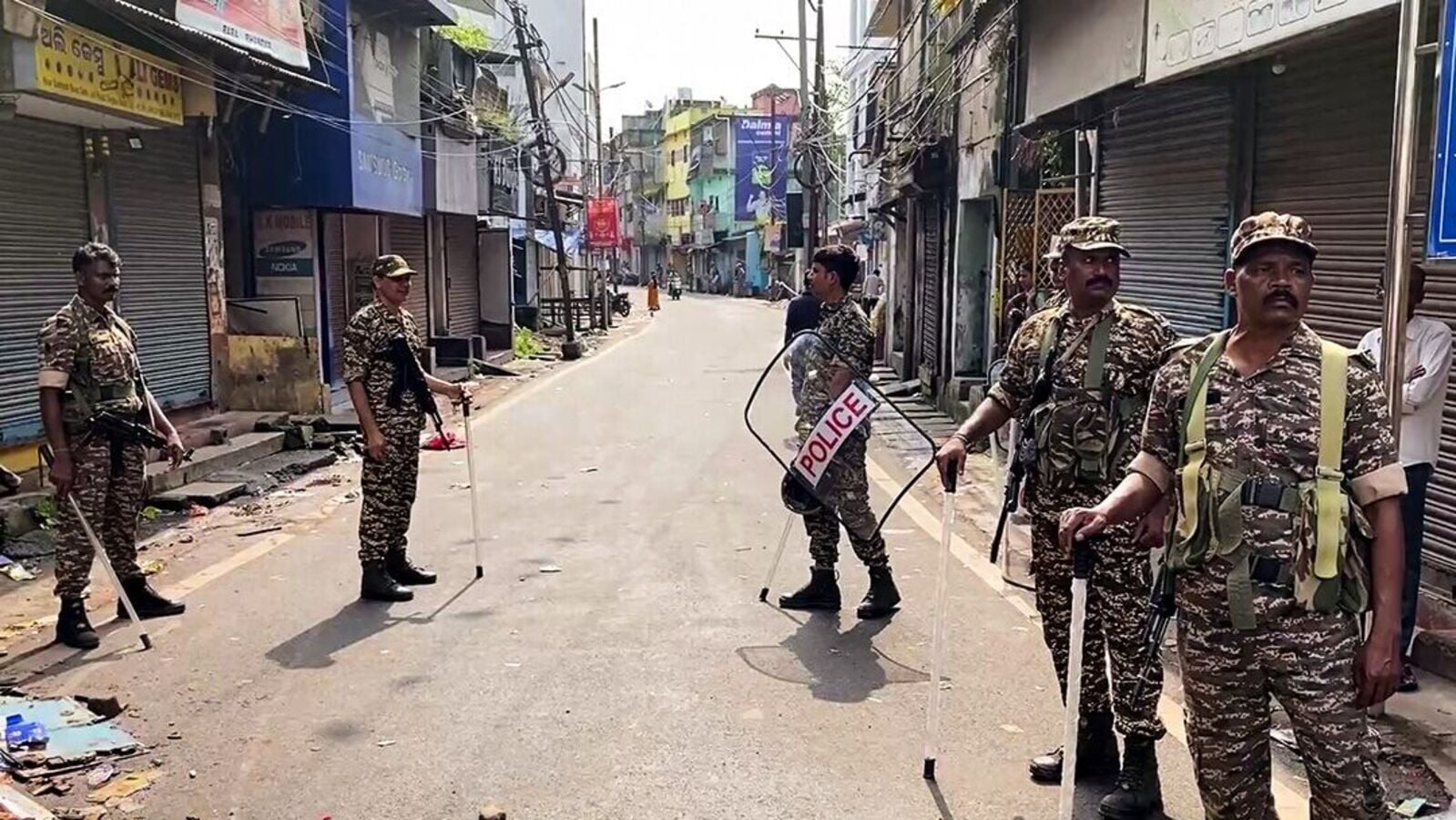Heavy police force deployed after a clash erupts during Durga Puja immersion, in Cuttack, on Saturday.