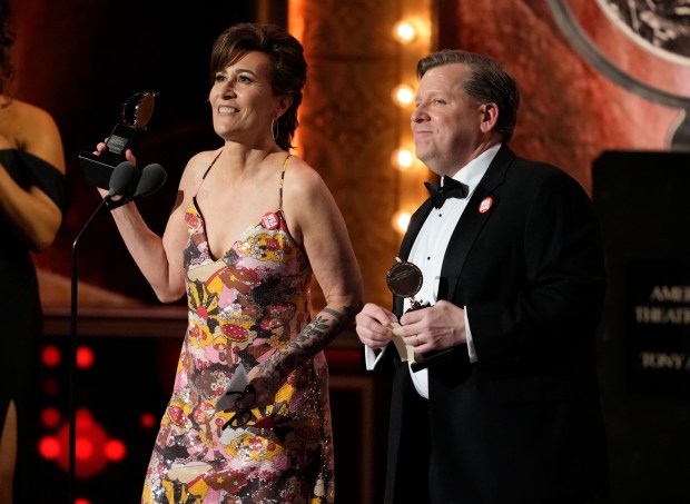 Jeanine Tesori and David Lindsay-Abaire accept the award for best original score for "Kimberly Akimbo" at the 76th annual Tony Awards on June 11, 2023, at the United Palace theater in New York. (Photo by Charles Sykes/Invision/AP)