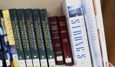 Copies of the Bible are displayed Aug. 12, 2024, at the Bixby High School library in Bixby, Okla. (AP Photo/Joey Johnson)