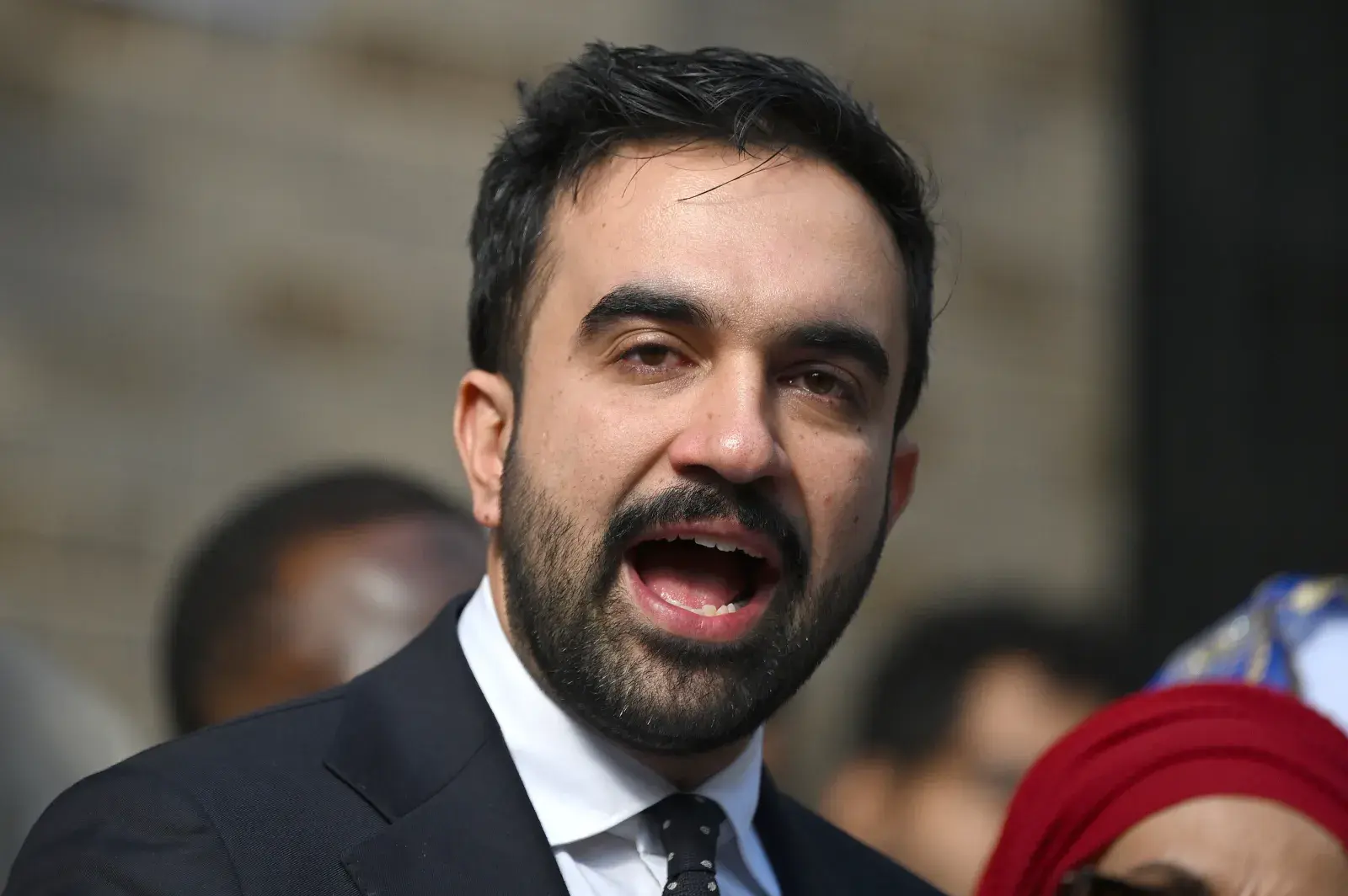 Zohran Mamdani, the Democratic front-runner in the New York City mayoral race, peaks to members of the press outside the Islamic Cultural Center, in the New York City borough of the Bronx, New York, on October 24, 2025.