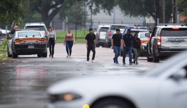 People who had appointments at a U.S. Immigration and Customs Enforcement office are turned away after a reported shooting in the facility in Dallas on Wednesday, Sept. 24, 2025. (AP Photo/Julio Cortez)