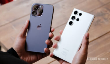 Apple iPhone 14 Pro Max vs Samsung Galaxy S23 Ultra in hand undecided