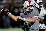 Richland quarterback Drew Kates looks to pass against Forney during the first half of the...
