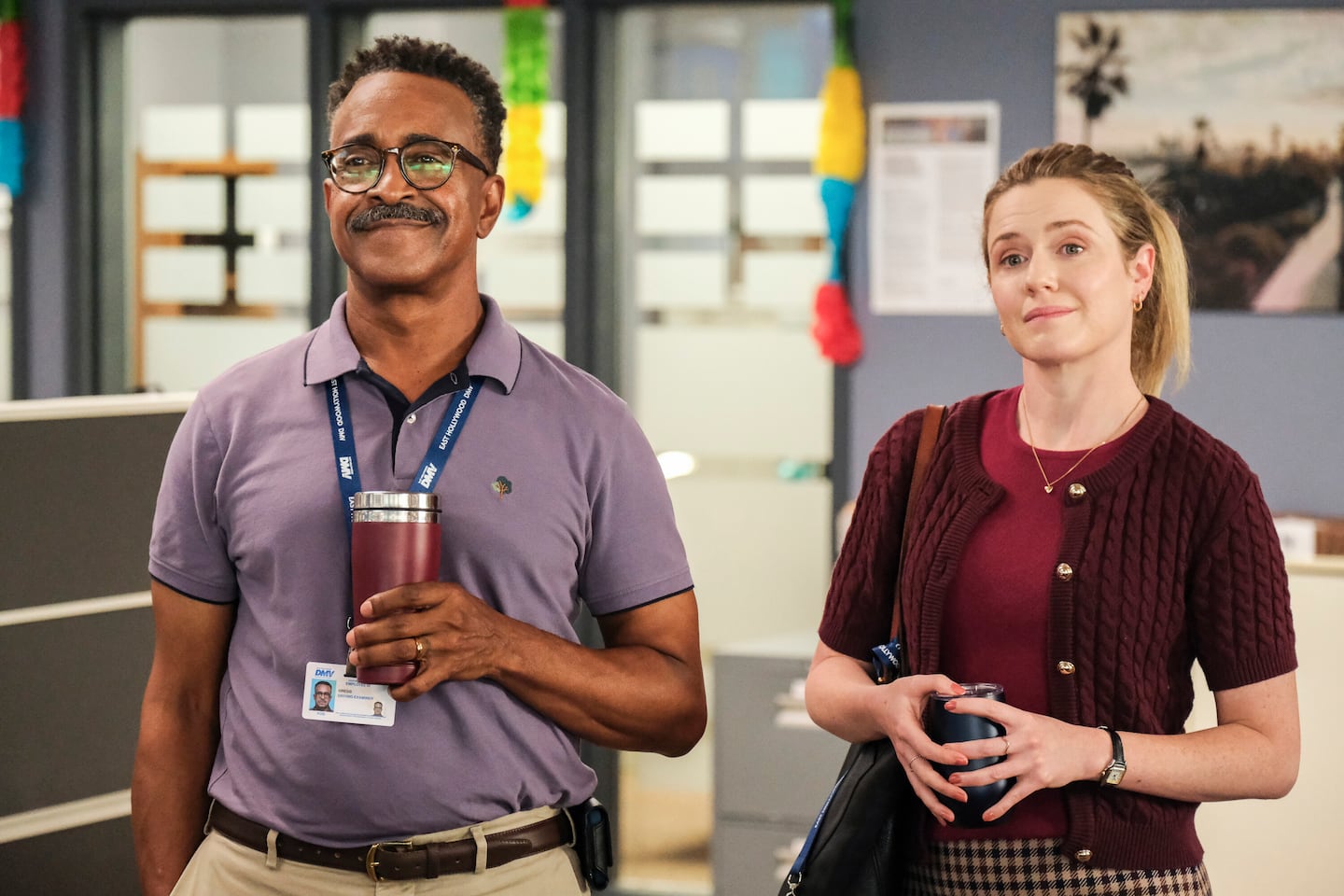 L to R: Tim Meadows as Gregg and Harriet Dyer as Colette on "DMV."