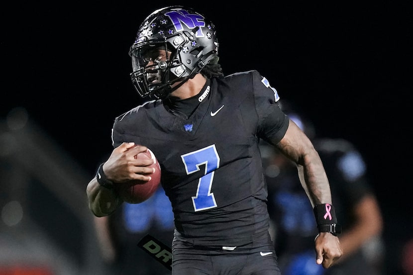 North Forney quarterback Legend Bey (7) carries the ball during the first half of a District...
