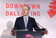 Downtown Dallas Parks Conservatory president Robert W. Decherd speaks to those gathered for...