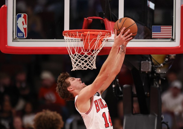 Chicago Bulls forward Matas Buzelis (14) dunks the ball in the third quarter during a game against the Atlanta Hawks, Monday, Oct. 27, 2025, at the United Center in Chicago. (Dominic Di Palermo/Chicago Tribune)