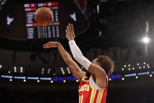 Atlanta Hawks guard Trae Young (11) makes a basket in the third quarter during a game against the Chicago Bulls, Monday, Oct. 27, 2025, at the United Center in Chicago. (Dominic Di Palermo/Chicago Tribune)