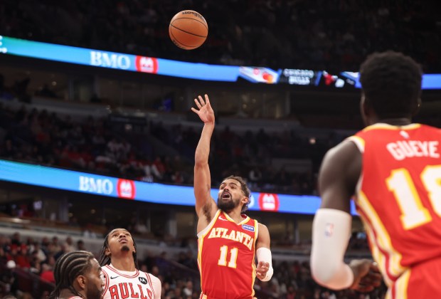 Atlanta Hawks guard Trae Young (11) makes a basket in the third quarter during a game against the Chicago Bulls, Monday, Oct. 27, 2025, at the United Center in Chicago. (Dominic Di Palermo/Chicago Tribune)
