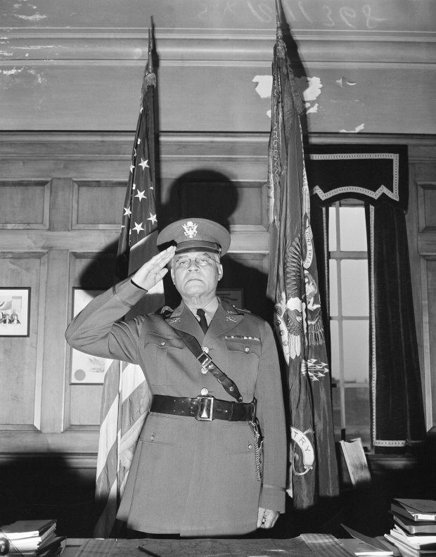 Col. Benjamin O. Davis Sr. stands behind his desk in his New York office on Oct. 25, 1940. He became the first Black general in U.S. Army history with his promotion by President Roosevelt to the rank of brigadier general. (Preston Stroup/AP)