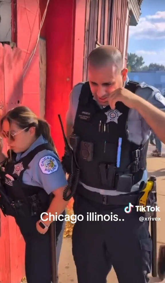 Chicago police officers are exposed to a chemical agent after arriving on the scene where a protester was shot by a federal immigration agent, and another detained, on the 3900 block of South Kedzie Avenue in Chicago's Brighton Park neighborhood on Oct. 4, 2025. (Ryan Garza)