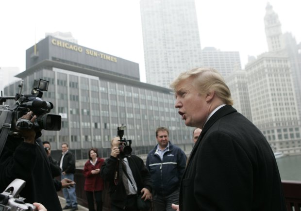 Donald Trump crosses the Wabash Avenue Bridge on Oct. 28, 2004, to attend the start of the demolition of the Sun-Times building in Chicago. (Scott Strazzante/Chicago Tribune)
