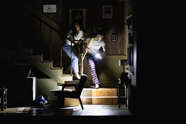 Cher Álvarez and Patrick Heusinger in "Paranormal Activity" in The Yard at Chicago Shakespeare Theater. (Kyle Flubacker)