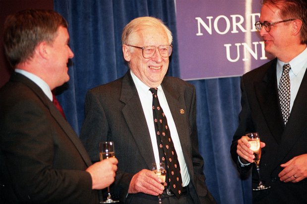 John A. Pople, center, celebrates his 1998 Nobel Prize in chemistry with Lawrence B. Dumans, provost for Northwestern University, left, and Eric J. Sundquist on Oct. 14, 1998. (Charles Cherney/Chicago Tribune)