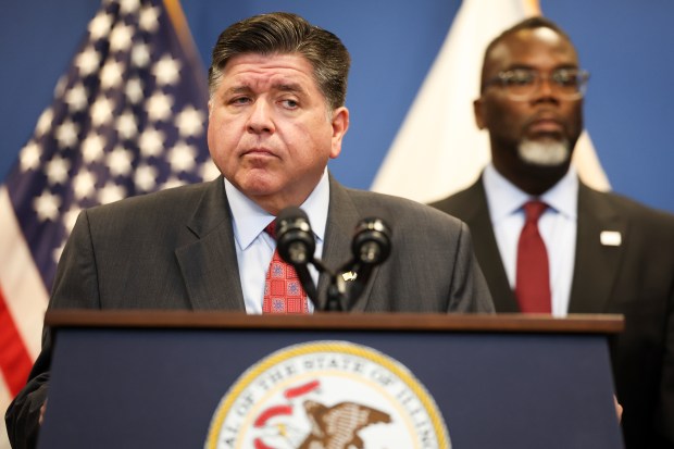 Gov. J.B. Pritzker listens to a question during a press conference about the federal deployments to Illinois and the ongoing federal activity in Chicago at his Chicago office in the West Loop on Oct. 6, 2025. (Eileen T. Meslar/Chicago Tribune)