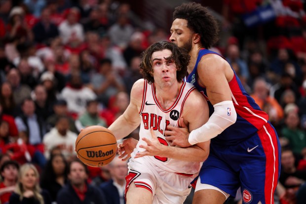 Detroit Pistons guard Cade Cunningham (2) fouls Chicago Bulls guard Josh Giddey (3) during the first quarter of the home opener at the United Center Wednesday Oct. 22, 2025 in Chicago. (Armando L. Sanchez/Chicago Tribune)