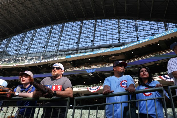 Chicago Cubs fans take in the scene before the start of the NL Division Series Game 1 between the Cubs and the Milwaukee Brewers at American Family Field in Milwaukee on Oct. 4, 2025. (Chris Sweda/Chicago Tribune)