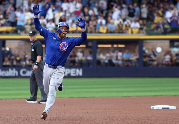 Chicago Cubs first baseman Michael Busch rounds the bases after hitting a solo home run in the first inning of the NL Division Series Game 1 against the Milwaukee Brewers at American Family Field in Milwaukee on Oct. 4, 2025. (Chris Sweda/Chicago Tribune)