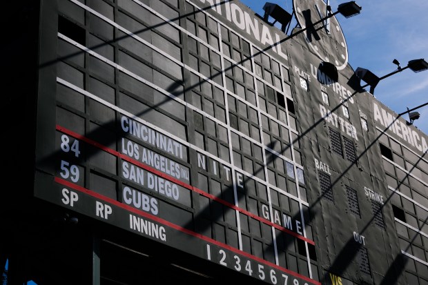 The centerfield scoreboard before the Cubs host the Padres in Game 2 of the wild-card series at Wrigley Field, Oct. 1, 2025. (Armando L. Sanchez/Chicago Tribune)