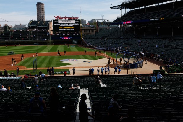 Padres players warm up before facing the Cubs in Game 2 of the wild-card series at Wrigley Field, Oct. 1, 2025. (Armando L. Sanchez/Chicago Tribune)