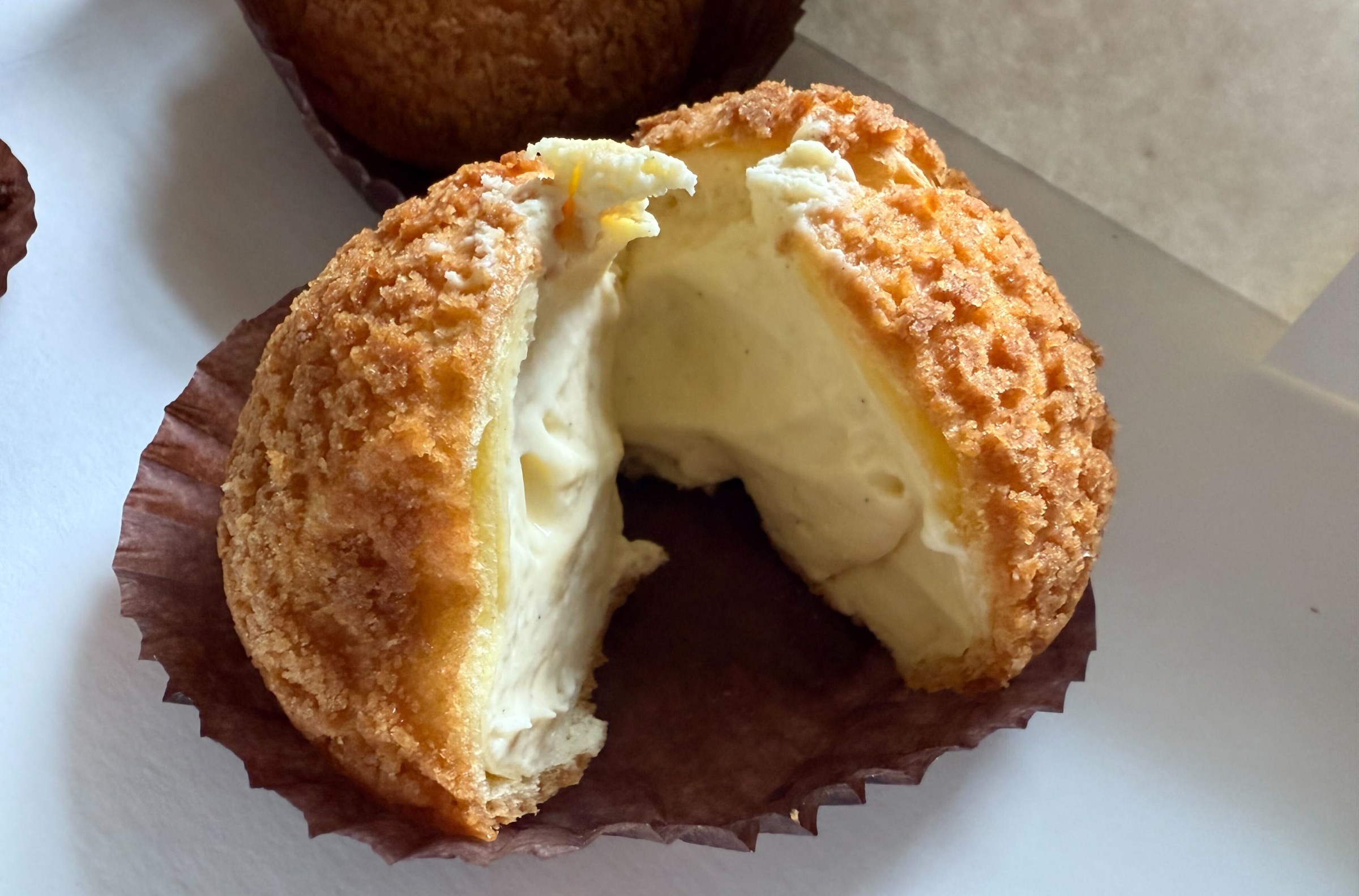 A nearly-split-in-half cream puff.