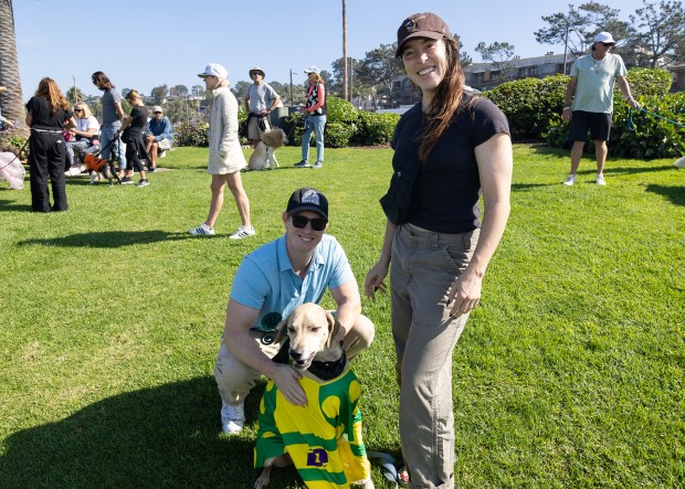 David and Megan Farrar with dog Baloo (Jon Clark)