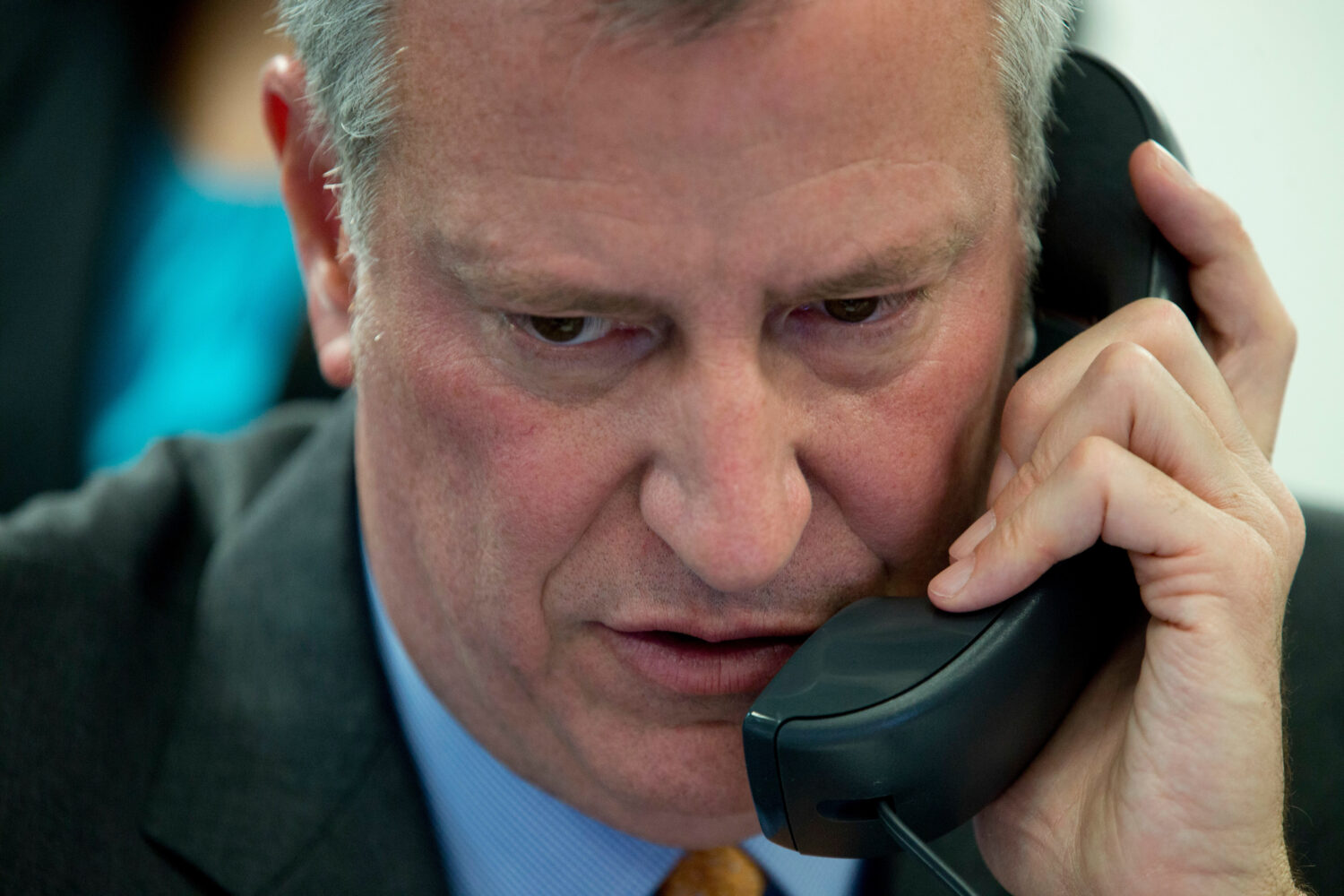 FILE - Then-New York City Mayor Bill de Blasio takes a phone call during the 14th Annual CUNY/Daily...