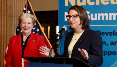 Doreen Harris, president of the New York state Energy Research and Development Authority, speaks at the 2025 Advanced Nuclear NY Summit in Syracuse, N.Y., on Sept. 30. Watching at her right is state Labor Commissioner Roberta Reardon.