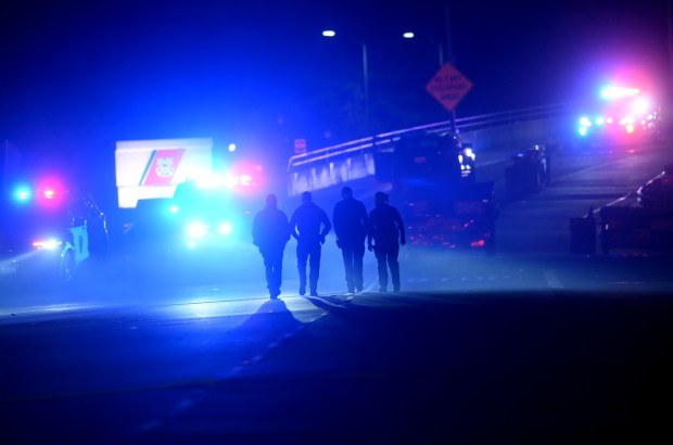 Police investigate after shots were fired near the Coast Guard Island entrance in Oakland, Calif. on Thursday, Oct. 23, 2025. U.S. Coast Guard police opened fire on a U-Haul truck after it backed up a ramp at the entrance to the Alameda island, where U.S. Customs and Border Patrol agents have been staying. (Jane Tyska/Bay Area News Group)