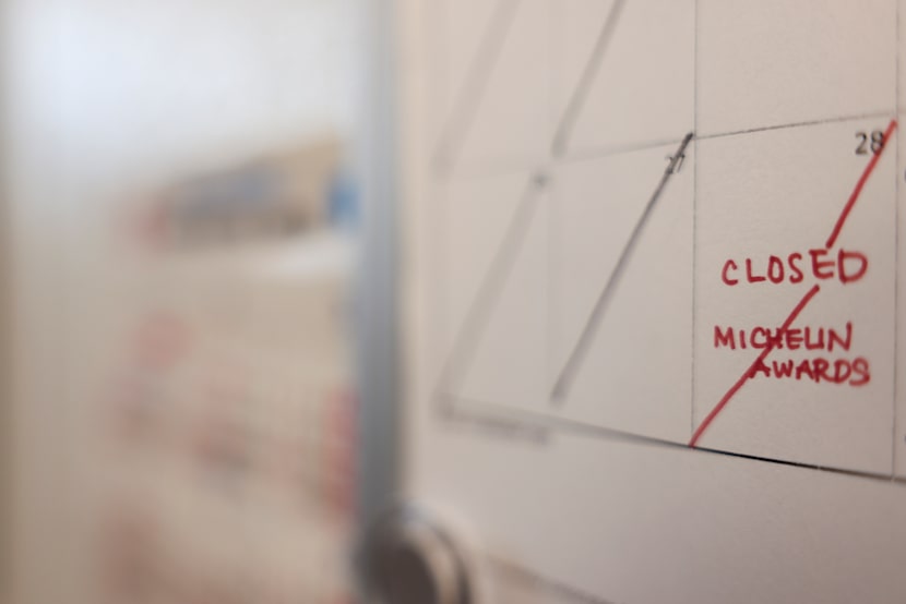 A calendar inside Tatsu Dallas' kitchen shows the omakase restaurant will be closed for the...