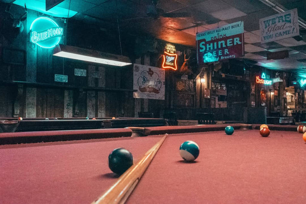 Image shows the pool table at the Dixie Chicken in College Station in Texas.