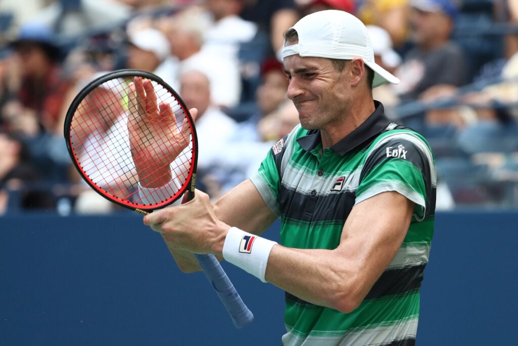 John Isner reacts during the 2018 US Open quarterfinals