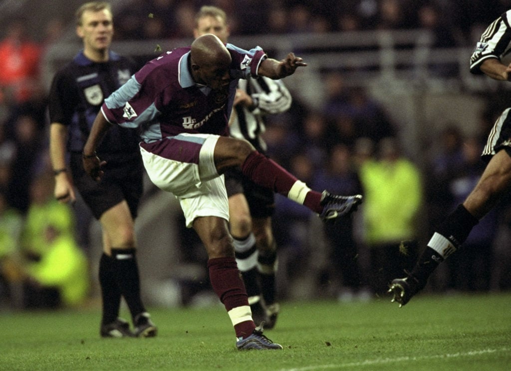 Ian Wright shoots during a Premier League clash between West Ham United and Newcastle
