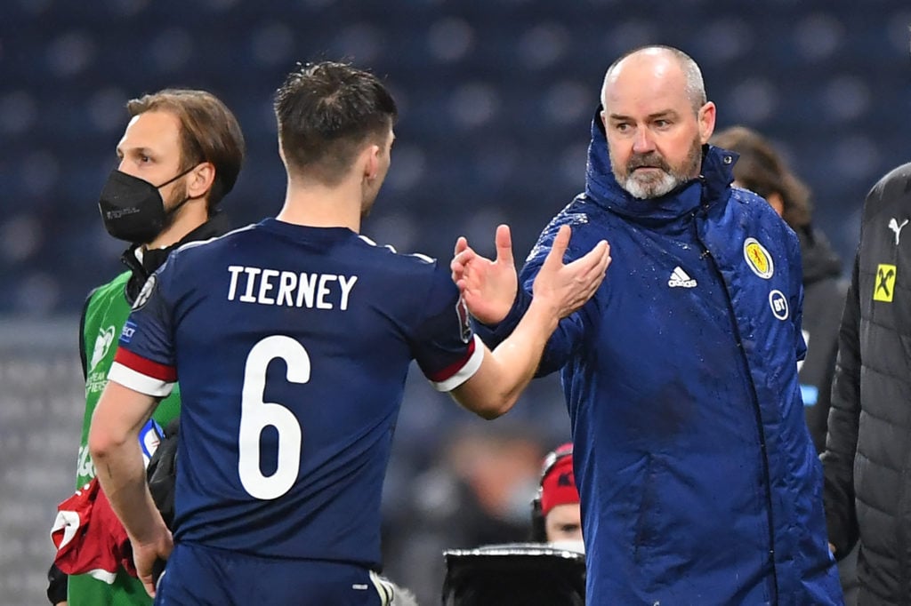 Scotland's head coach Steve Clarke (R) congratulates Scotland's defender Kieran Tierney (L) after the FIFA World Cup Qatar 2022 qualification football match between Scotland and Austria at Hampden Park