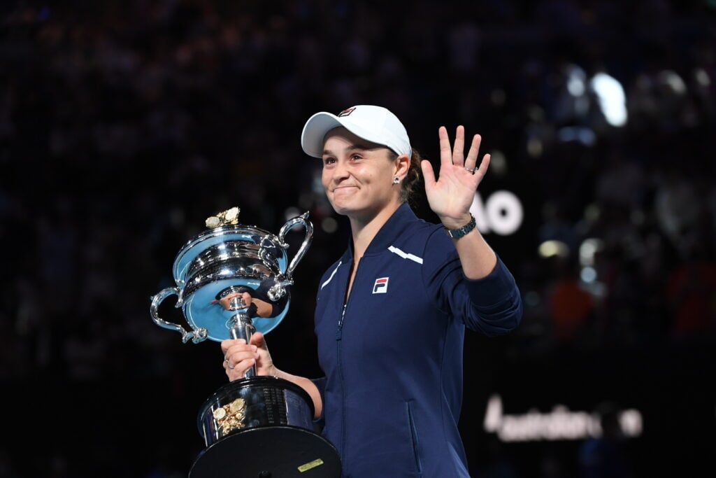 Ash Barty waves to the crowd after winning the 2022 Australian Open