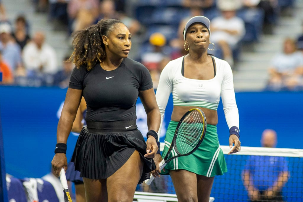 Serena Williams and Venus Williams of the United States on Arthur Ashe Stadium during their Women's Doubles match against Lucie Hradecka and Linda Noskova of the Czech Republic during the US Open Tennis Championship 2022 at the USTA National Tennis Centre.