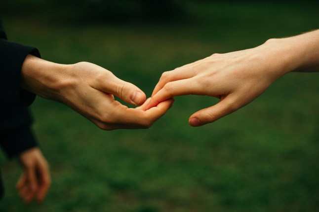 Couple holding hands