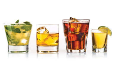 Three alcoholic cocktails and tequila shot