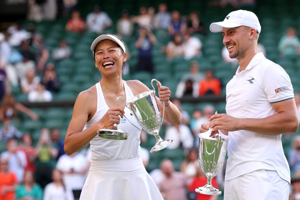 Su-Wei Hsieh of Chinese Taipei and Jan Zielinski of Poland smile with their Mixed Doubles Trophies following victory against Santiago Gonzalez of Mexico and Giuliana Olmos of Mexico in the Mixed Doubles Final during day fourteen of The Championships Wimbledon 2024 at All England Lawn Tennis and Croquet Club.