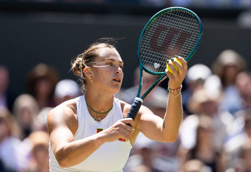 Aryna Sabalenka serving at Wimbledon in 2025