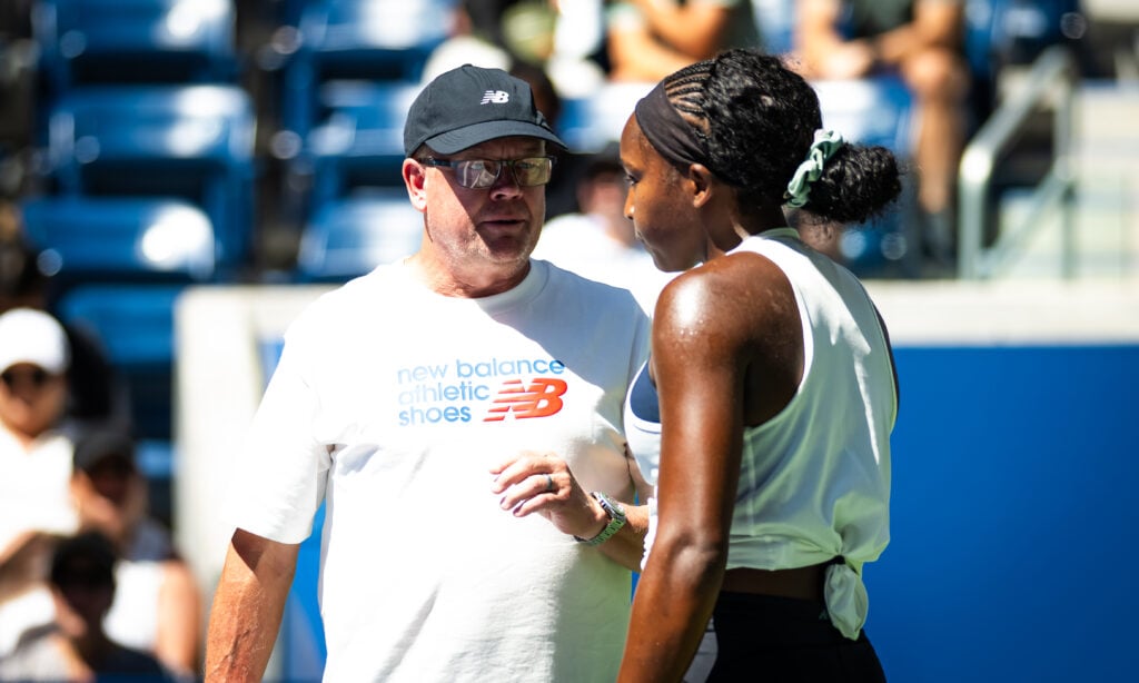 Gavin MacMillan and Coco Gauff in conversation during practice ahead of the 2025 US Open