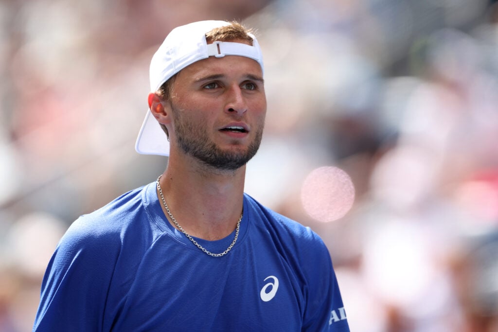 Leandro Riedi of Switzerland looks on against Alex De Minaur of Australia during their Men's Singles Fourth Round match on Day Nine of the 2025 US Open at USTA Billie Jean King National Tennis Center on September 1, 2025 in the Flushing neighborhood of the Queens borough of New York City.