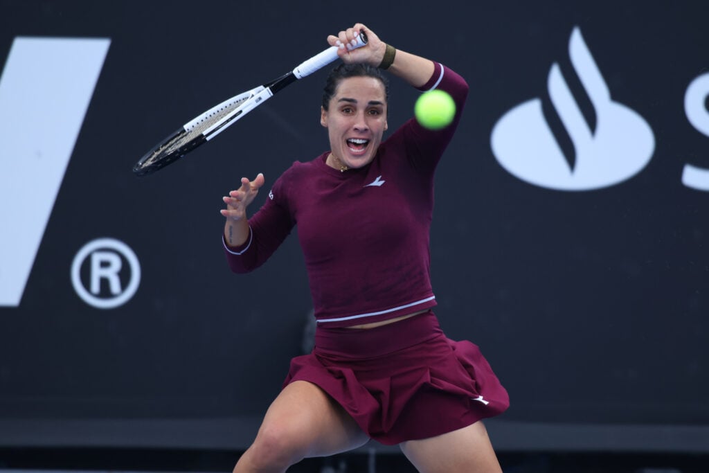 Martina Trevisan of Italy plays a forehand against Rebecca Marino of Canada during day 2 of the WTA 500 Guadalajara Open Akron at Mouratoglou Tennis Center.