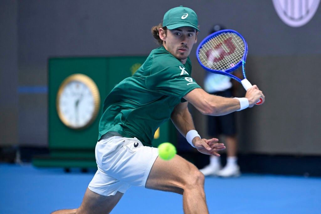 Alex De Minaur hits a return to Czech Republic's Jakub Mensik during their men's singles match at the China Open tennis tournament in Beijing.