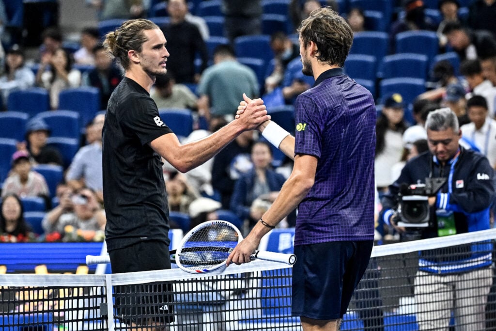 Daniil Medvedev and Alexander Zverev meet at the net after their match at the 2025 China Open.