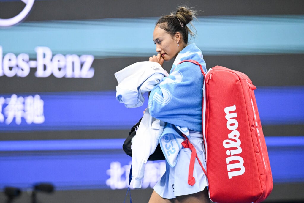 Qinwen Zheng reacts during her match against Linda Noskova at the China Open.